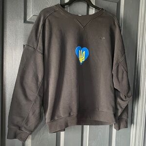 Roxy Black Crewneck Sweatshirt with Blue & Yellow Heart Emblem